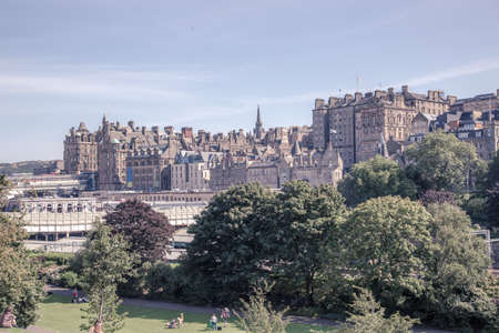 Edinburgh, UK - August 24, 2021: Edinburgh old town view from the City park at sunny dayのeditorial素材