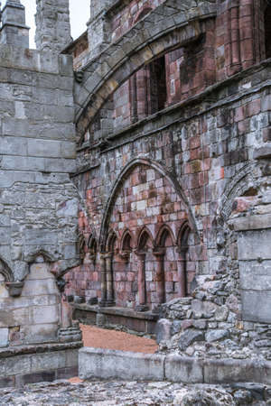 United Kingdom, Edinburgh - 26 August, 2021:  Gothic ruins  of Augustinian Holyrood Abbey, established in 12th centuryのeditorial素材