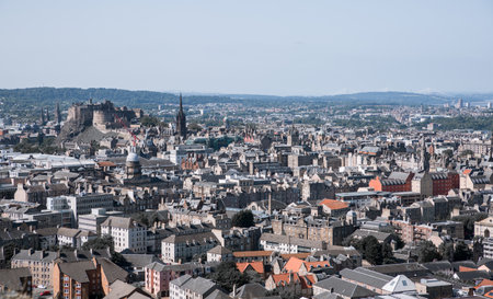 Scotland, Edinburg - August 26, 2021: Edinburgh old city view from the Arthur's sit, nature Holyrood park. View include castle of Edinburghのeditorial素材
