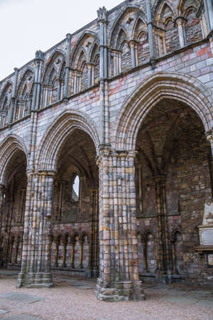 Scotland, Edinburgh, UK - August 26, 2021: Ruins of Holyrood Abbey founded in 1128 by David I.のeditorial素材