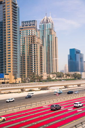 Dubai, UAE - September 2, 2022:  Sheikh Zayed road, the main road of Dubai view with cars and Dubai Marina skyscrapersのeditorial素材