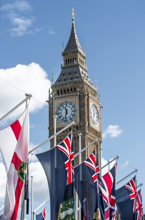 London, UK - September 16, 2022:  Big Ben, British and commonwealth countries flags during the funeral ceremony of Queen Elizabeth IIのeditorial素材