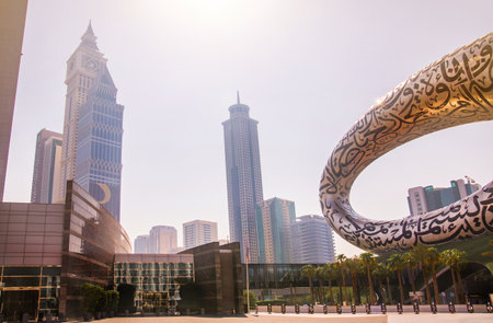 Dubai, UAE - September 2, 2022: Emirates office towers and city square at hot sunny dayのeditorial素材