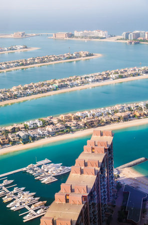 Dubai, UAE - August 28, 2022: The Palm Jumeirah. Holidays villas, beaches and luxury hotels view at sunset.のeditorial素材