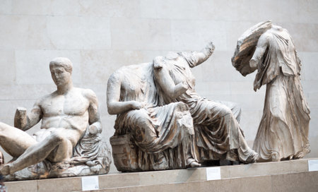 London, UK - October 20, 2022: Dionysos and goddess group from from  Acropolis of Athens. Life-size pediment sculptures from the Parthenon friezeのeditorial素材
