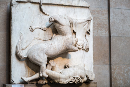 London, UK - October 20, 2022:  Centauromachy, battle Centaur and a Lapith. Metopes, detail of Parthenon frieze.のeditorial素材