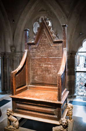 London, UK - November 27, 2022:  The Coronation Chair, known as St Edward's Chair or King Edward's Chair 1300. Used for coronation of all British monarchsのeditorial素材
