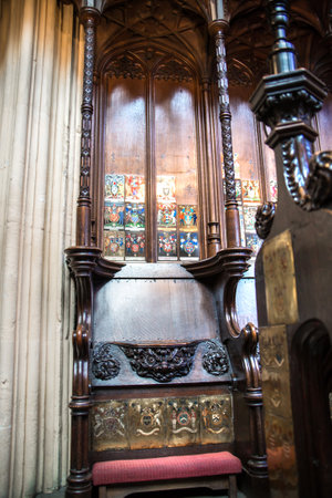 London, UK - November 27, 2022:  Nobility sits in Henry VII Lady Chapel, Westminster. Sits decorated with family arms and symbolsのeditorial素材