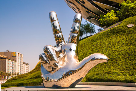 Dubai, UAE - September 2, 2022: Sheikh Mohammed's Three-Finger Salute sculpture at Sheikh Zayed roadのeditorial素材