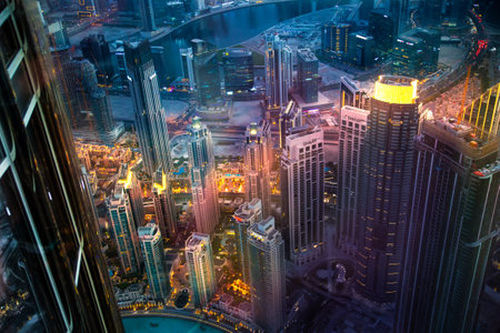 Dubai, UAE - August 28, 2022: Dubai city at night, view with lit up skyscrapers and roads.のeditorial素材