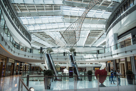 Dubai, UAE - September 2, 2022: Dubai Mall shopping centre view with bridges and escalators. The biggest shopping place in the world.のeditorial素材