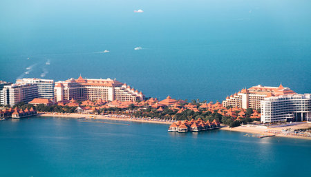 Dubai, UAE - August 28, 2022: Hotels at Palm Jumeirah distance view at hot sunny day.のeditorial素材