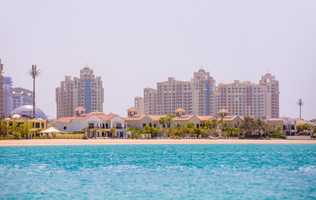 Dubai, UAE September 1, 2022: Holidays villas at Palm Jumeirah and Atlantis hotel at distant
