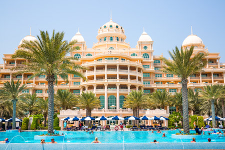 Dubai, United Arab Emirates - August 26, 2023: People relaxing in swimming pollen the Palm Jumeirahのeditorial素材