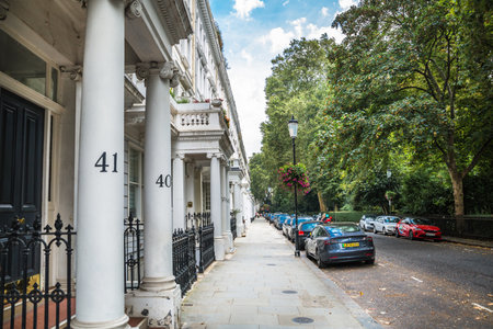 London, UK - 9 September, 2023: Beautiful periodic building of Kensington, one of the richest areas to live with fancy lifestyle. Street photographyのeditorial素材