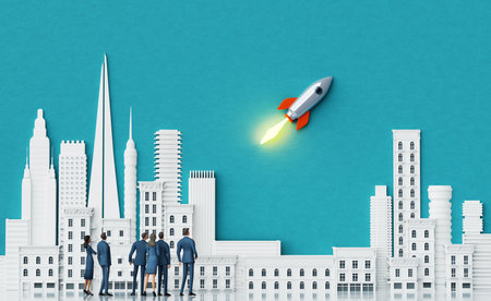 Business people watching a successful start of rocket, new business, new company startup conceptの写真素材