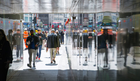 London, UK - 30 April, 2024: People passing the pedestrian tunnel in the City of Londonのeditorial素材