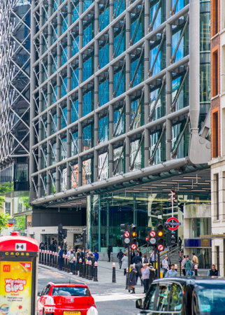 London, UK - 30 April, 2024: Cannon Street view with people crossing the road and cars.のeditorial素材