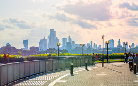 London, UK - 14 June, 2025: Beautiful sunset in Canary Wharf, view with corporate buildingsのeditorial素材