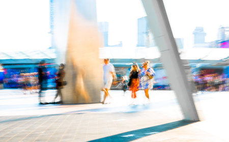 Beautiful motion blur of walking people in London, postmodernism style