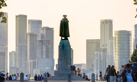 London, UK - 25 October, 2025:   Canary Wharf banking and business area at sunset , view from the Greenwich hill.のeditorial素材
