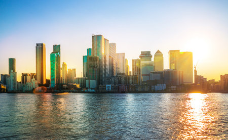 London, UK - 18 June, 2025: Canary Wharf business and banking area panoramic view from the river...