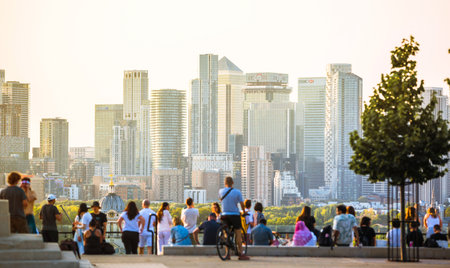 London, UK - 25 October, 2025:   Canary Wharf banking and business area at sunset , view from the Greenwich hill.のeditorial素材