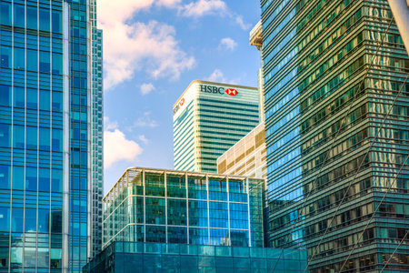 London, UK - 14 June, 2025: Corporate buildings of Canary Wharf at sunset.のeditorial素材