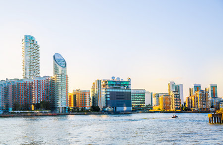 London, UK - 18 June, 2025: Canary Wharf business and banking area panoramic view from the river...