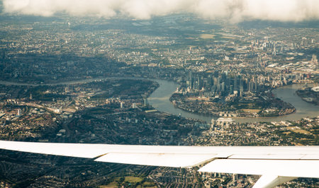 London, UK - 29 August 2024: London view from airplane,  City of London and river Thames