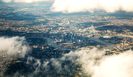 London, UK - 29 August 2024: London view from airplane,  City of London and river Thames