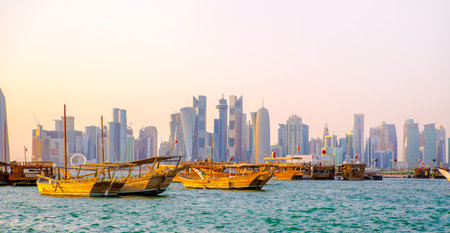 Qatar, Doha - September 5, 2025:  Doha old port at sunset and traditional fisherman boats