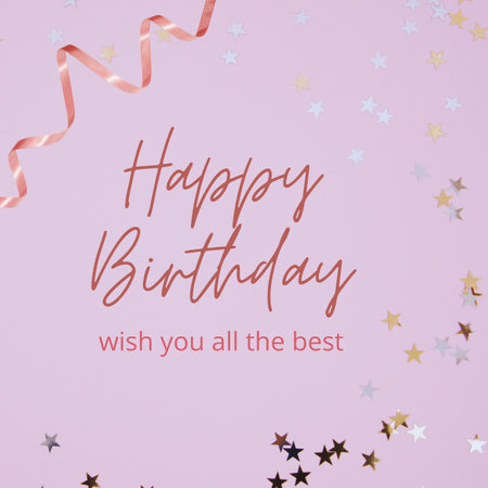 Happy birthday card with confetti and ribbons on a pink backgroundの写真素材