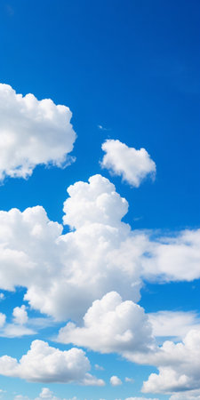 Blue sky background with tiny clouds, natural pattern, copy space.の素材