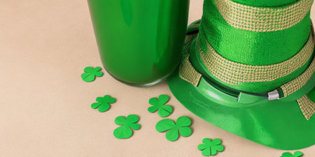 St. Patrick's Day background with shamrock and green beer bottleの素材