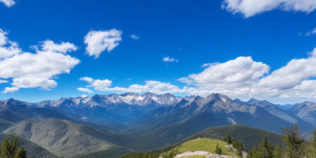 Panoramic view of the mountains and clouds in the blue skyの素材