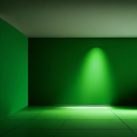 Green room with green wall and floor illuminated by a beam of lightの素材