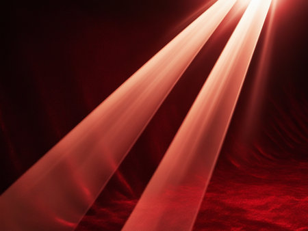 abstract scene with rays of light on a dark red stage backgroundの写真素材