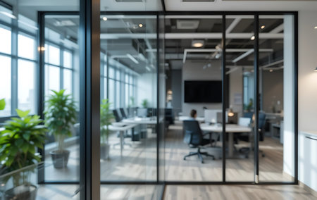 Blurred background of modern office interior with glass wall and meeting roomの写真素材