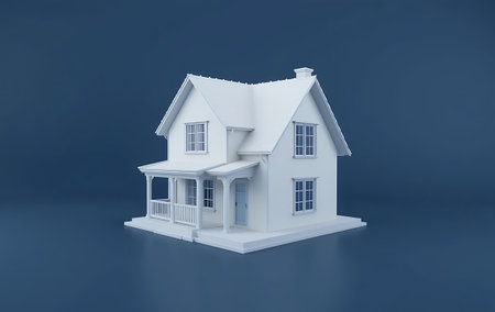 3d render of a house on a blue background with copy spaceの写真素材