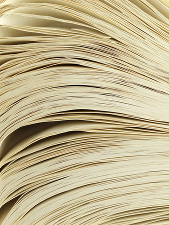 close up of the pages of a book in yellow color