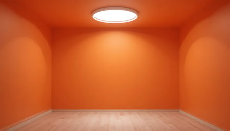 Empty room with orange wall and ceiling light. 3d rendering.の写真素材