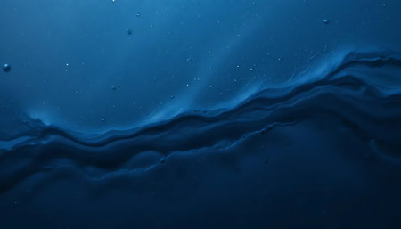 Blue water surface with ripples and waves. Abstract background for design.の写真素材
