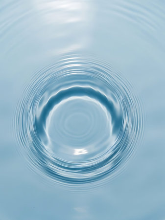 drop of clean water on a background of rippled water surface