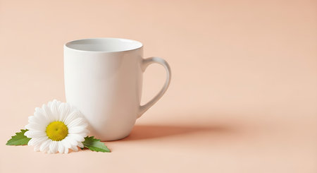White cup with daisy on beige backgroundの写真素材