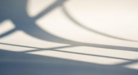 abstract background of shadows on a white wall with sunlight and shadowsの写真素材