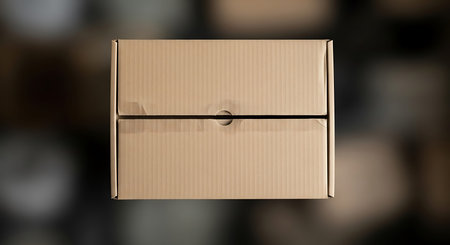 close up of a cardboard box on a blurred background, delivery concept
