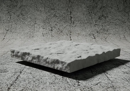 3D rendering of a white marble podium on a textured backgroundの写真素材