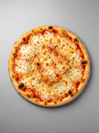 Pizza with mozzarella cheese and tomato sauce on a gray backgroundの写真素材