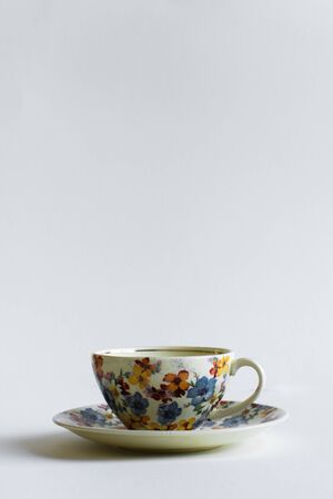 Colorful vintage cup on white backgroundの写真素材
